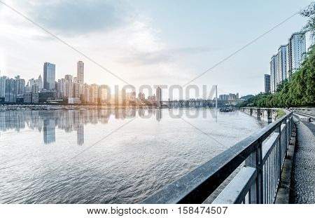 andscape of downtown near water of chongqing in blue sky