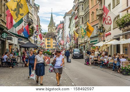 ZURICH,SWITZERLAND - SEPTEMBER 3,2016 - In the streets of Zurich. Zurich is the largest city in Switzerland.