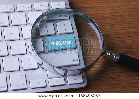 Education concept: computer keyboard with word Education selected focus on enter button 3d render