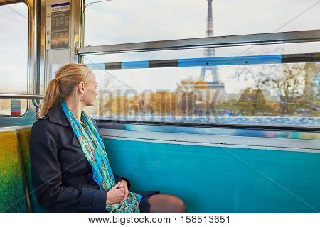 Beautiful Young Woman Travelling In A Train Of Parisian Underground