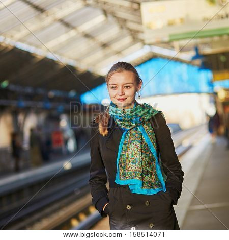 Beautiful Young Woman Waiting For A Train
