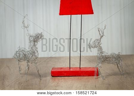 handmade santa claus and two wired reindeers figures