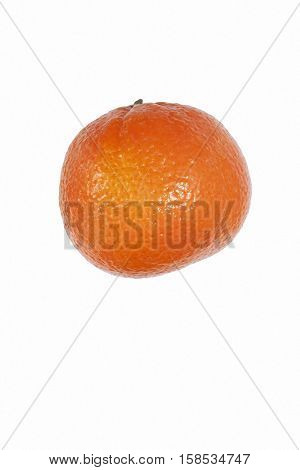 Clementine (Citrus x hybrid Clementina). Hybrid between Mandarin orange and Sweet orange. Image of single fruit isolated on white background