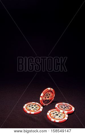 Heap Of Red Poker Chips On Black Background