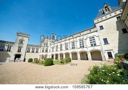 Castle courtyard Breze, Loire Valley, France. Built between the 11th and 19th centuries, it houses an extraordinary subterranean complex, a castle in a castle.