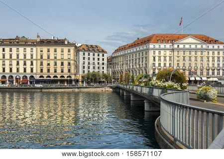 GENEVA, SWITZERLAND - September 04: view along the Pont des Bergues bridge at the facade of the Four Seasons Hotel des Bergues on September 04, 2016
