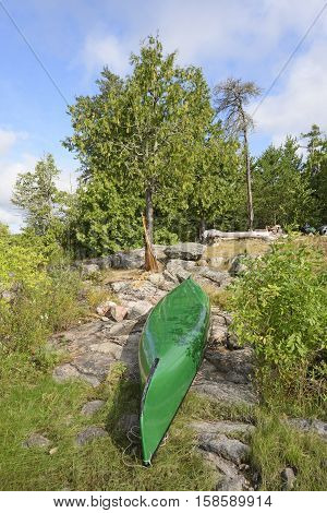 Canoe in Camp in the Shore on Kawnipi Lake in Quetico Provincial Park in Ontario