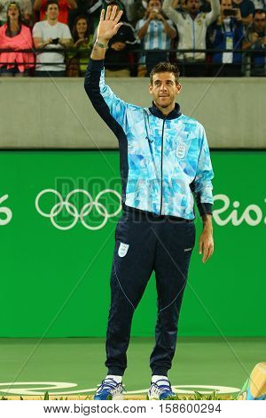 RIO DE JANEIRO, BRAZIL - AUGUST 14, 2016: Silver medalist Juan Martin Del Potro of Argentina during tennis men's singles medal ceremony of the Rio 2016 Olympic Games at the Olympic Tennis Centre