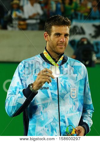 RIO DE JANEIRO, BRAZIL - AUGUST 14, 2016: Silver medalist Juan Martin Del Potro of Argentina during tennis men's singles medal ceremony of the Rio 2016 Olympic Games at the Olympic Tennis Centre