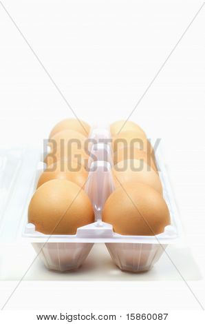 Ägg i ägg facket på sömlös bakgrund.