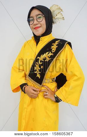 Labuan,Malaysia-Nov 26,2016:Malay lady with zapin custome during Borneo festival in Labuan.Zapin is a dance form that is popular in Indonesia & Malaysia,especially in the state of Johor.