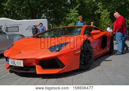 TURKU, FINLAND - JUNE 13, 2015: Orange Lamborghini Aventador LP 700-4 
