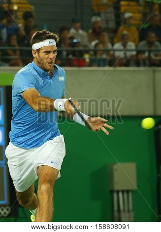 RIO DE JANEIRO, BRAZIL - AUGUST 14, 2016: Grand Slam champion Juan Martin Del Potro of Argentina in action during his men singles final match of the Rio 2016 Olympic Games at the Olympic Tennis Centre