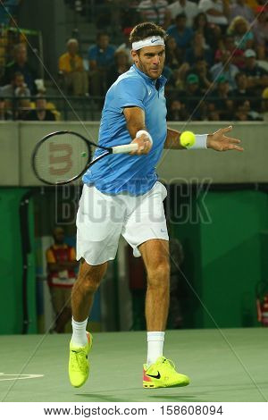 RIO DE JANEIRO, BRAZIL - AUGUST 14, 2016: Grand Slam champion Juan Martin Del Potro of Argentina in action during his men singles final match of the Rio 2016 Olympic Games at the Olympic Tennis Centre