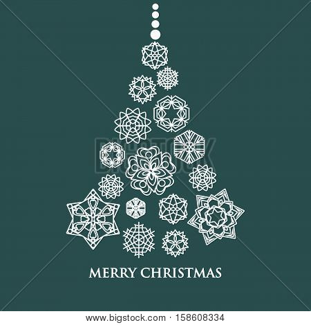 White snowflake set Christmas tree on green background