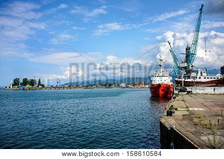 ship and crane in the port of the southern city