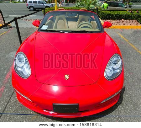 Las Vegas, United States of America - May 05, 2016: Luxurious and Colorful Cars for Rent Waiting in the Parking Lot of a Supermarket on the Las Vagas Strip, Nevada on May 05, 2016