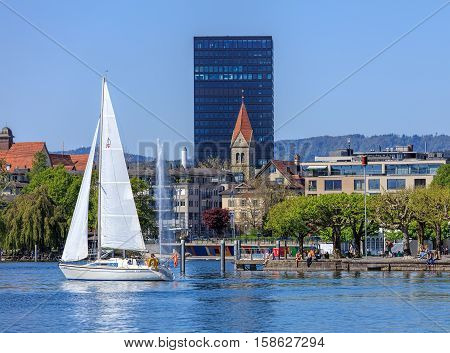Zug, Switzerland - 6 May, 2016: view on the city of Zug from Lake Zug. The city of Zug is the capital of the Swiss canton of Zug. Lake Zug is a lake in central Switzerland, situated between Lake Lucerne and Lake Zurich.