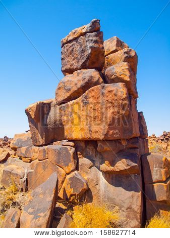 Giant's Playground rock formations on sunny day with clear blue sky near Keetmanshoop, Namibia, Africa