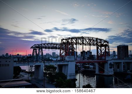 IRON BRIDGES OF LA BOCA WITH SUNSET