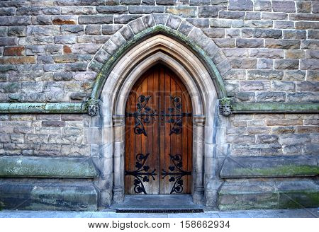 Beautiful architecture of the rear entrance into the old church in city center of Birmingham , United Kingdom