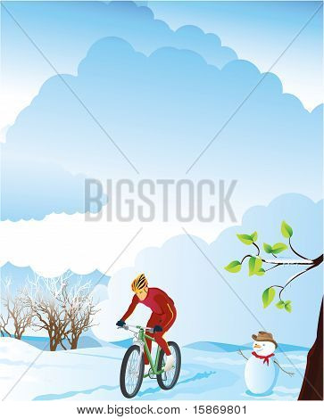Winter landscape with a mountain biker.