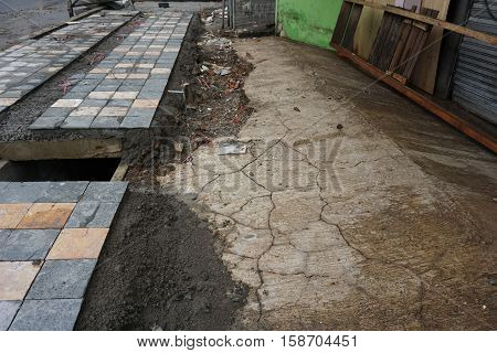 sidewalk pavement construction in depok indonesia photo