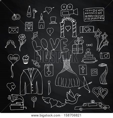 Set wedding symbols and signs isolated on chalk board