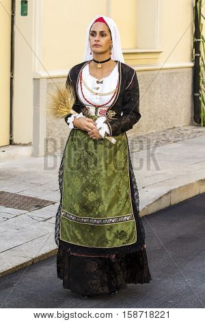SELARGIUS, ITALY - September 11, 2016: Former marriage Selargino - Sardinia - portrait of a beautiful girl in traditional Sardinian costume