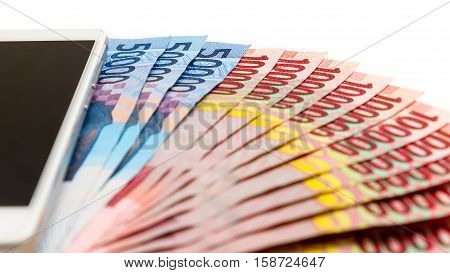 Smartphone And Money Of Indonesian Rupiah
