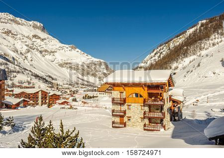 Alpine winter mountain landscape. French Alps covered with snow in sunny day. Val-d'Isere, France