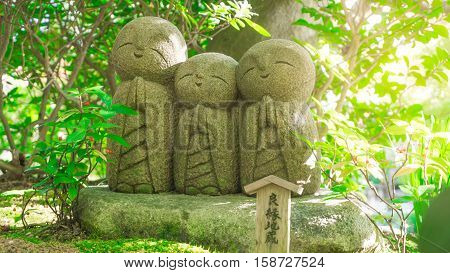 Lots of little monk buddha stone statues in Japan temple
