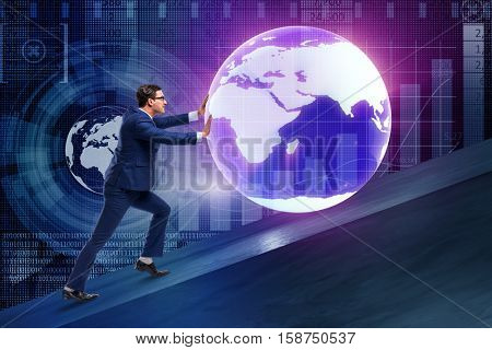 Businessman pushing earth in business concept