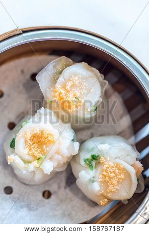 Chinese dim sum Hagao with scallop - Steamed Chinese groumet cuisine