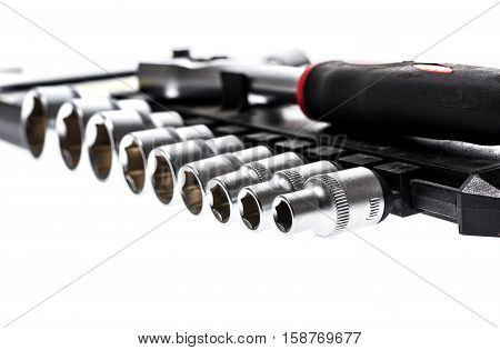 Set Of Metallic Socket Wrench Tools Isolated On White Background.