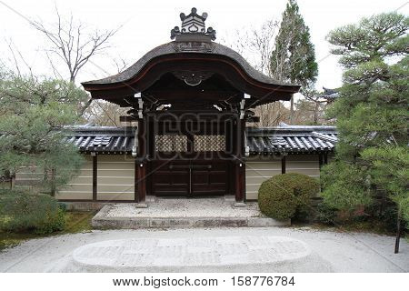 Wooden gate at buddhist temple in Kyoto Japan