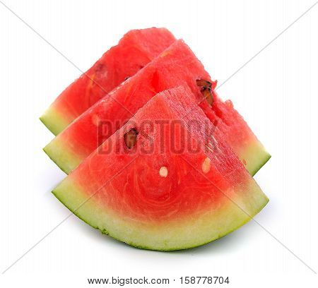 closeup of some pieces of refreshing watermelon on a white background