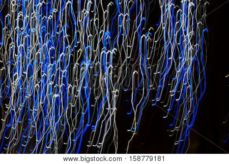 Abstract background made of Christmas lights with long exposure.