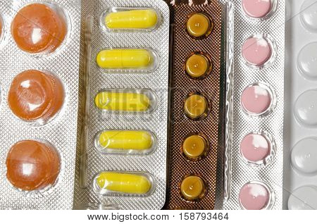 the set of medicines to treat various ailments and support the immune system. Isolated on white background