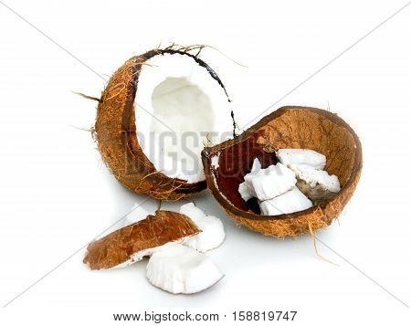 Coconut pieces broken isolated on white background as package design element