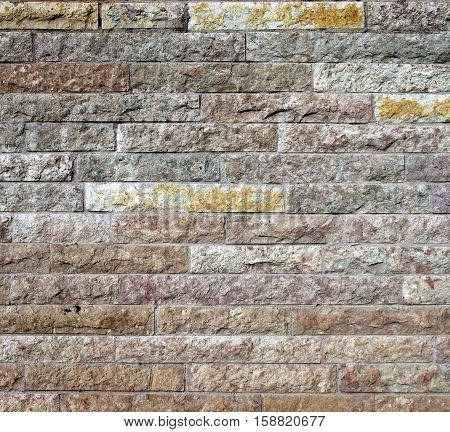 texture of yellow brown rough brick wall