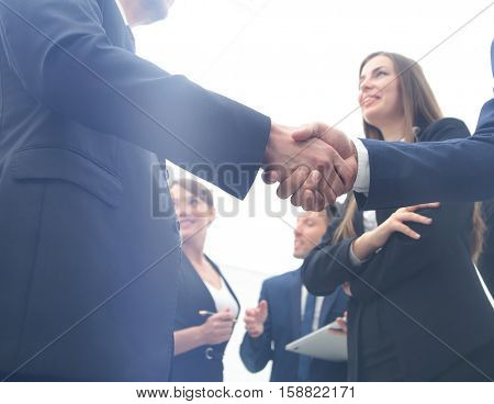 Business handshake. Business handshake and business people conce