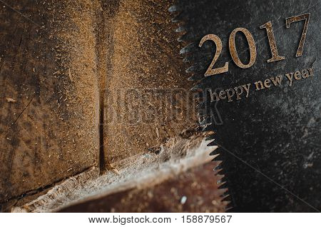 a hacksaw on the old table background texture lies