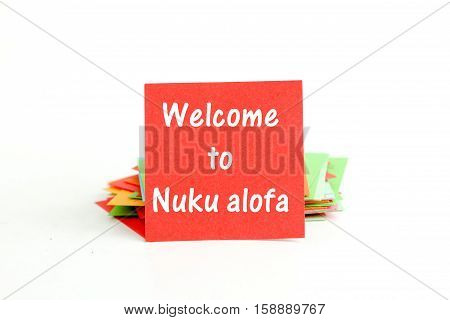 picture of a red note paper with text welcome to Nuku alofa