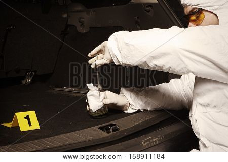 Crime scene investigation - collecting of odor traces by criminologist