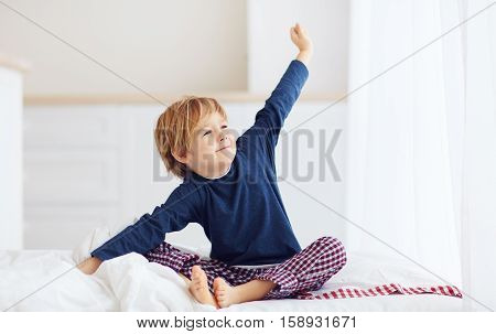 Peppy Young Boy Waking Up In The Morning