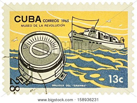 MOSCOW RUSSIA - NOVEMBER 26 2016: A stamp printed in Cuba shows Cuban ship Granma and compass series "Museum of the Revolution" circa 1965