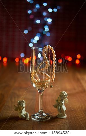 Glass Of Champagne And Beads