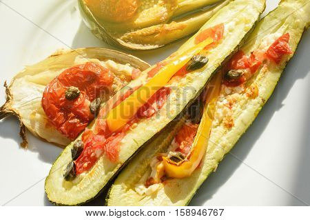Organic ingredients - tasty eggplant aubergine coocked in owen with mix of tomato capers onions and cheese