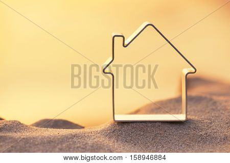 House on beach during sunset. Concept and idea